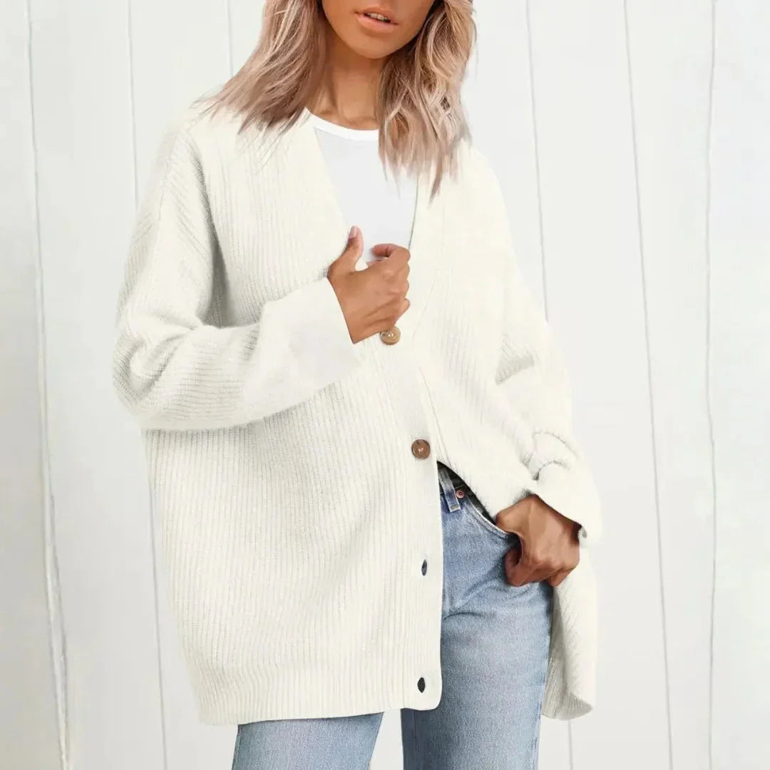 Stylish women's longline oversized cardigan with buttons; a chic & versatile layering piece for any look.