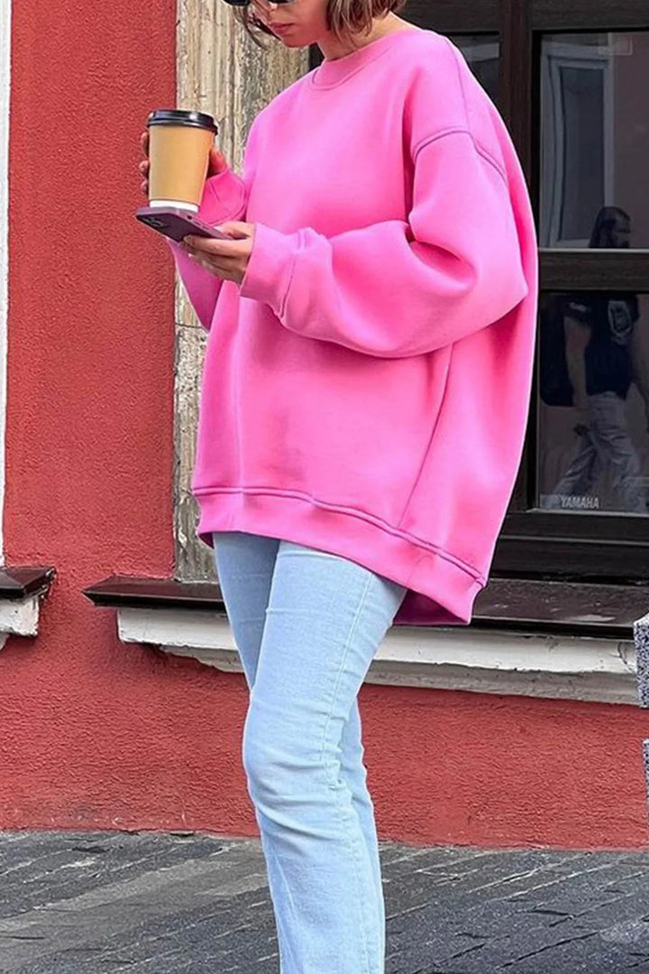 Women's oversized round neck sweatshirt, relaxed fit for ultimate comfort & casual style.