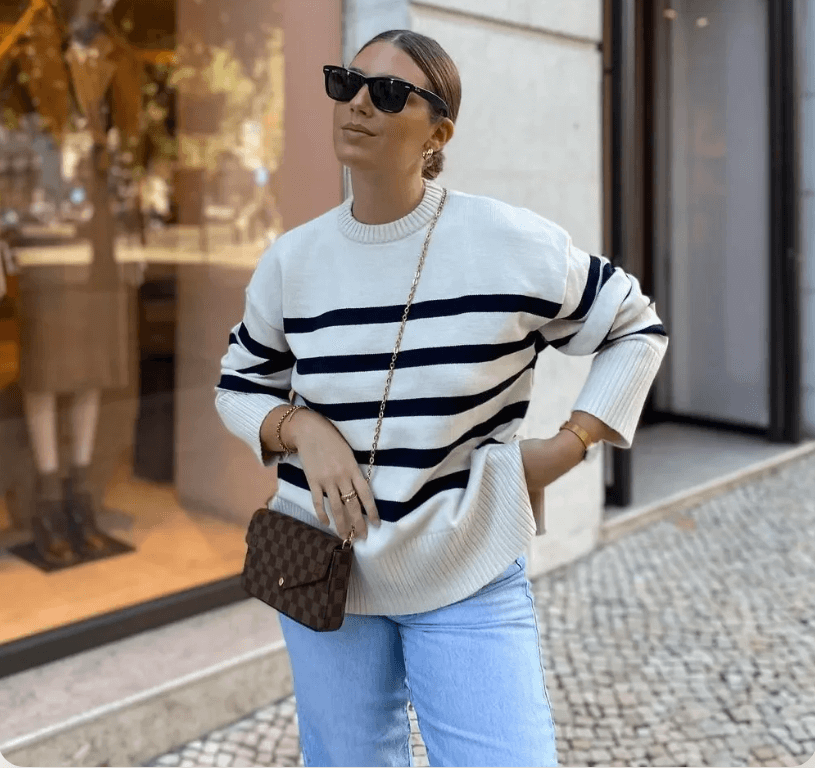 Casual long-sleeve women's oversized striped knitted sweater, a cozy cotton blend top for everyday fall fashion.