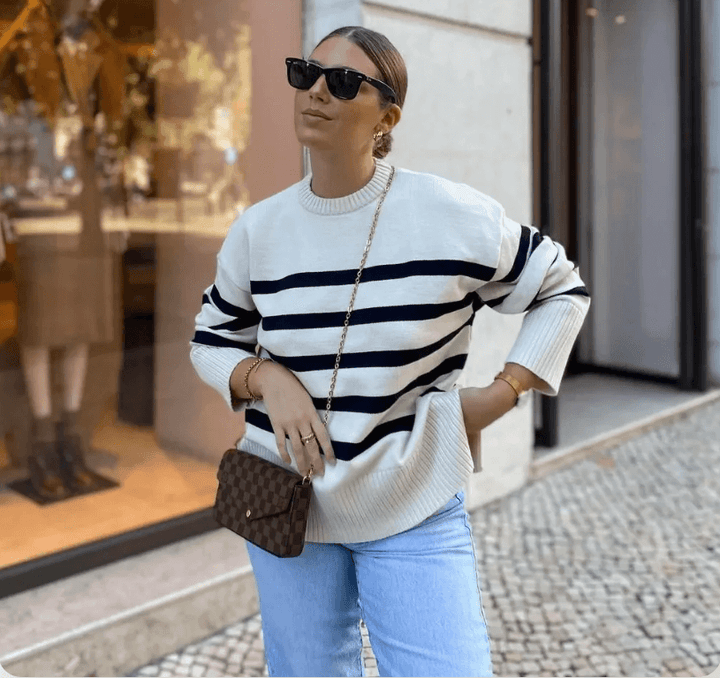 Casual long-sleeve women's oversized striped knitted sweater, a cozy cotton blend top for everyday fall fashion.
