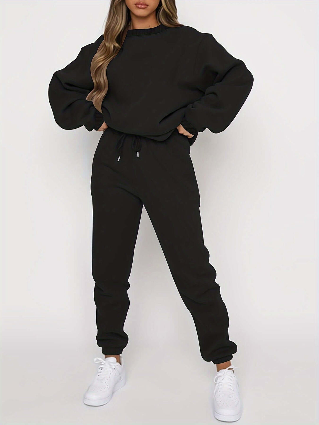 Ultra-comfortable women's tracksuit with an oversized sweater and joggers set, designed for ultimate relaxation.