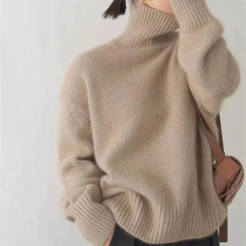 Cozy women's turtleneck sweater, oversized and warm for ultimate chic winter fashion comfort.