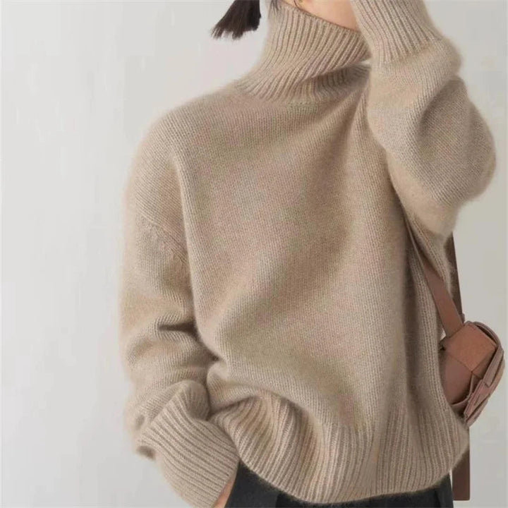 Cozy women's turtleneck sweater, oversized and warm for ultimate chic winter fashion comfort.