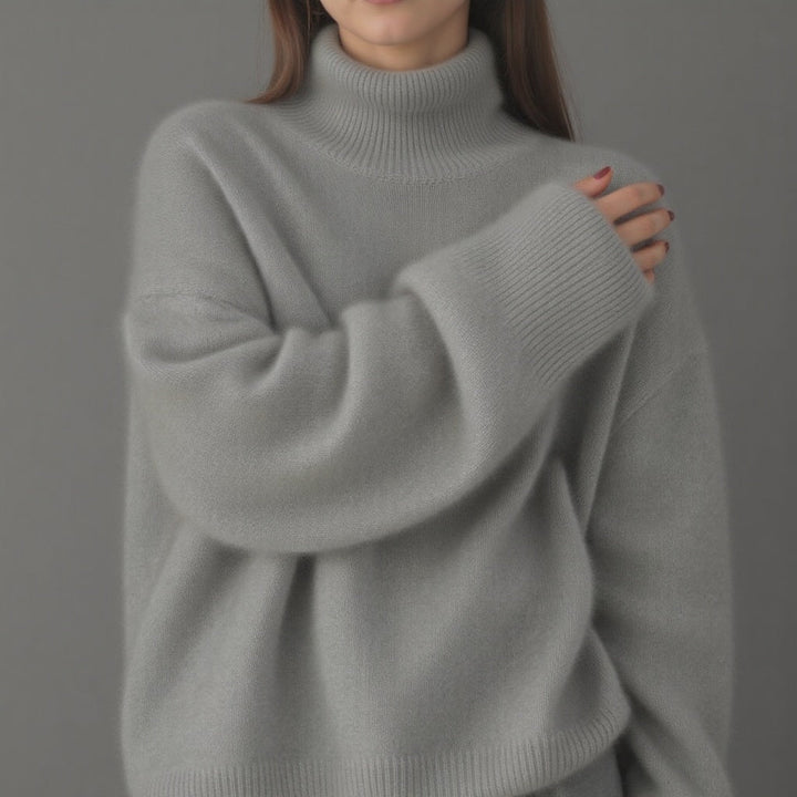 Cozy women's oversized turtleneck sweater, perfect casual comfort & chic elegant top for winter.