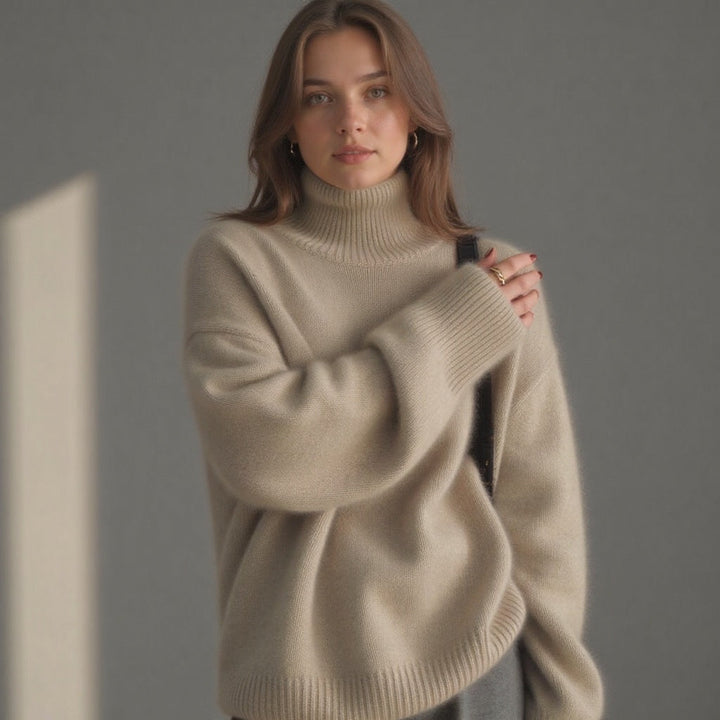 Women's oversized turtleneck sweater, blending cozy comfort with chic winter fashion & warmth.