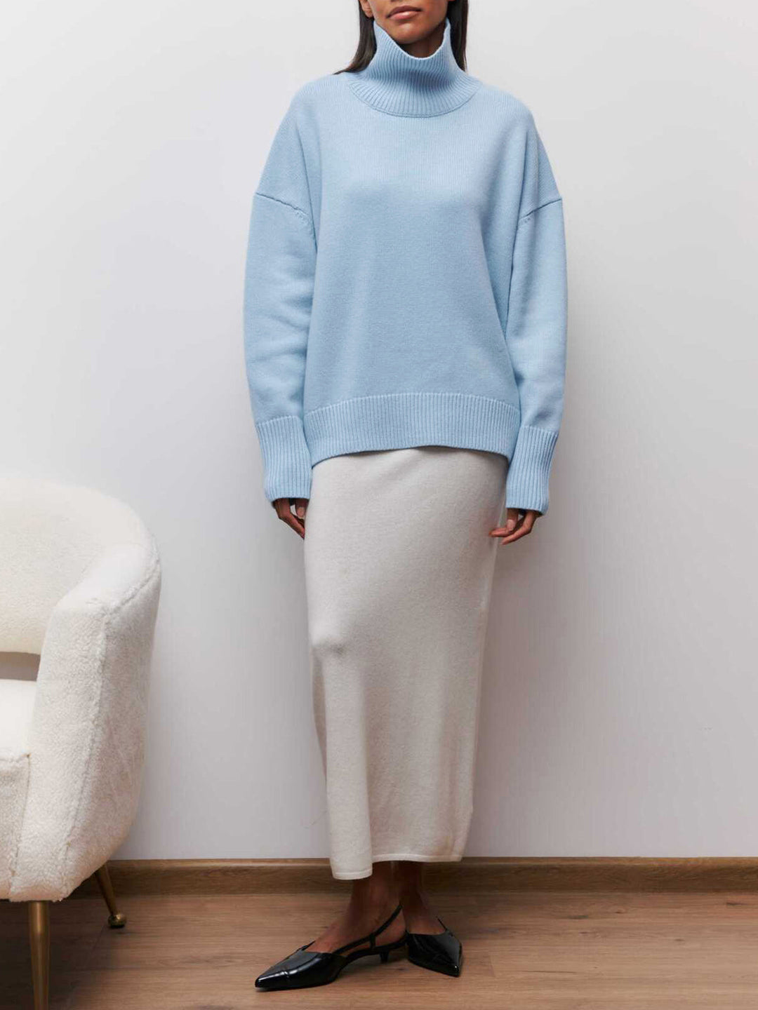 Relaxed fit women's oversized turtleneck sweater, warm & cozy, effortless casual winter style.