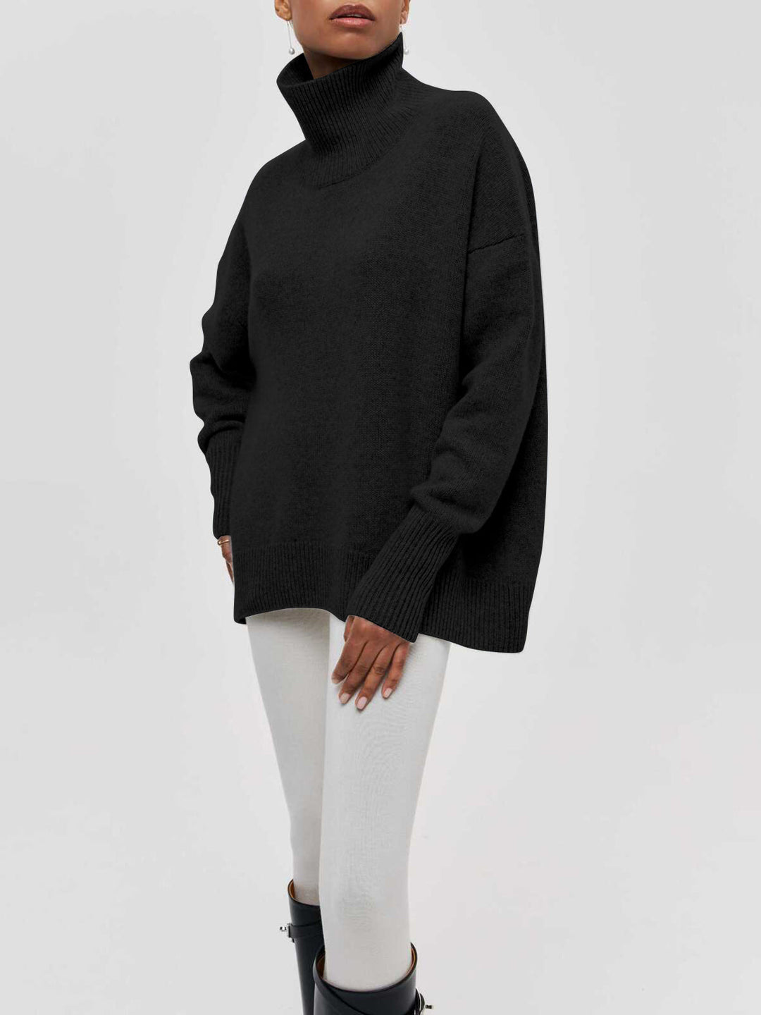 Flat lay of women's warm oversized turtleneck sweater, long sleeve knitwear, cozy winter fashion.