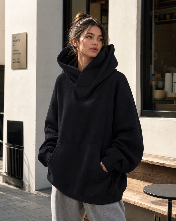 Soft, cozy women's oversized turtleneck sweatshirt. Ideal for relaxed urban comfort & casual winter wear.