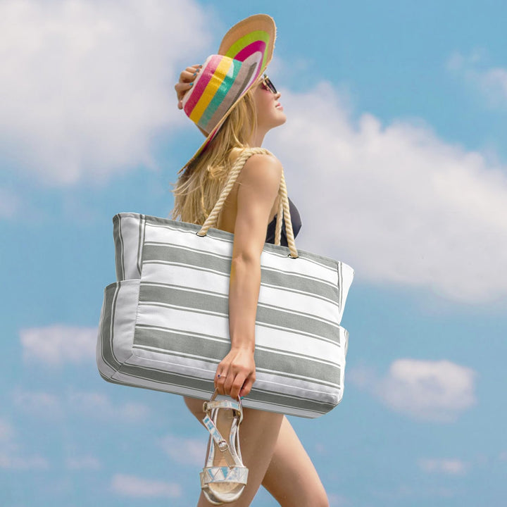 Women's travel accessory: oversized, waterproof & sandproof beach tote.