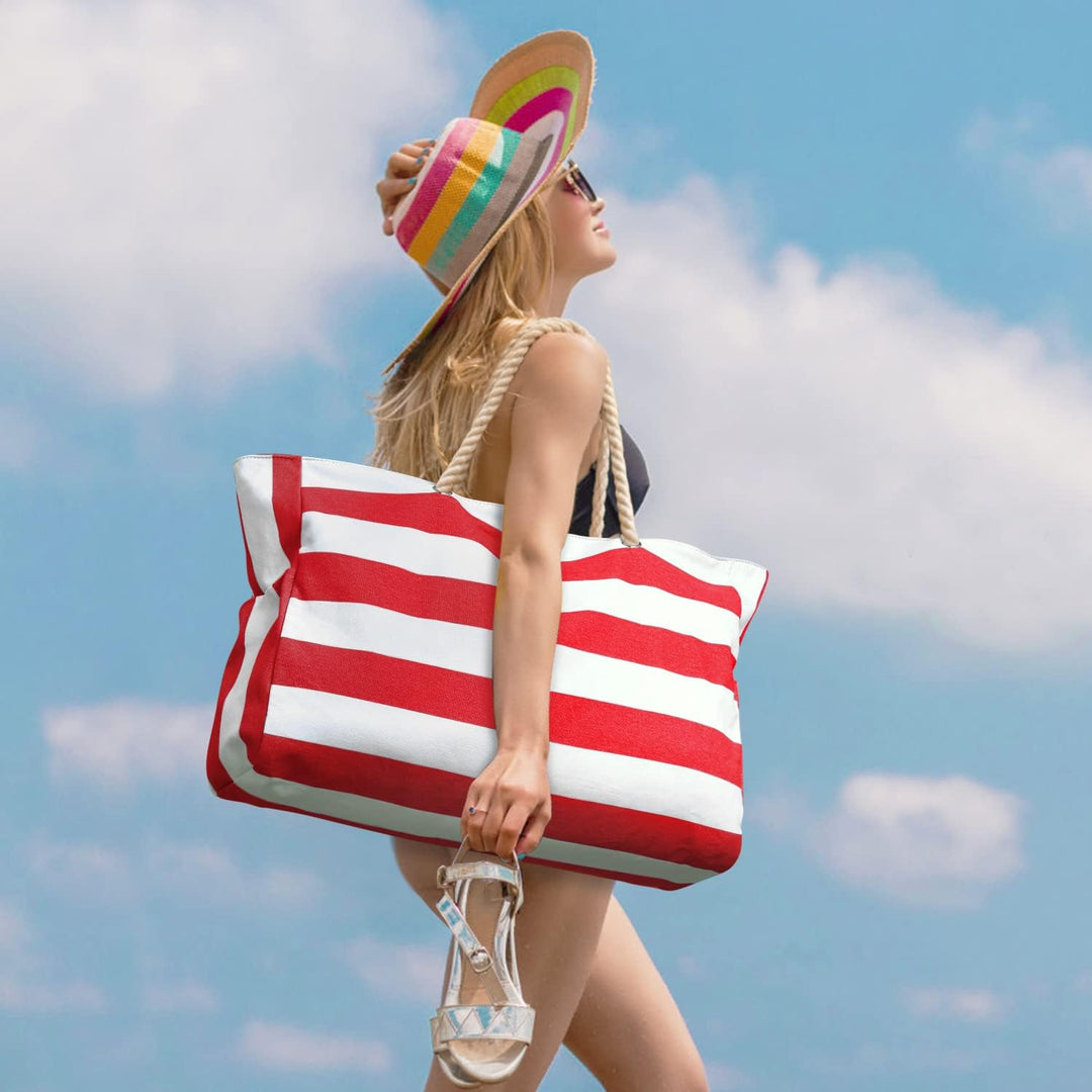 Durable polyester women's oversized beach bag, waterproof & sandproof.