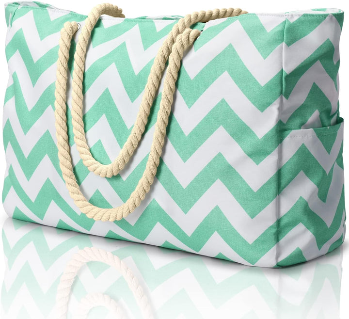 Oversized waterproof & sandproof beach bag for women, ideal for pool days.