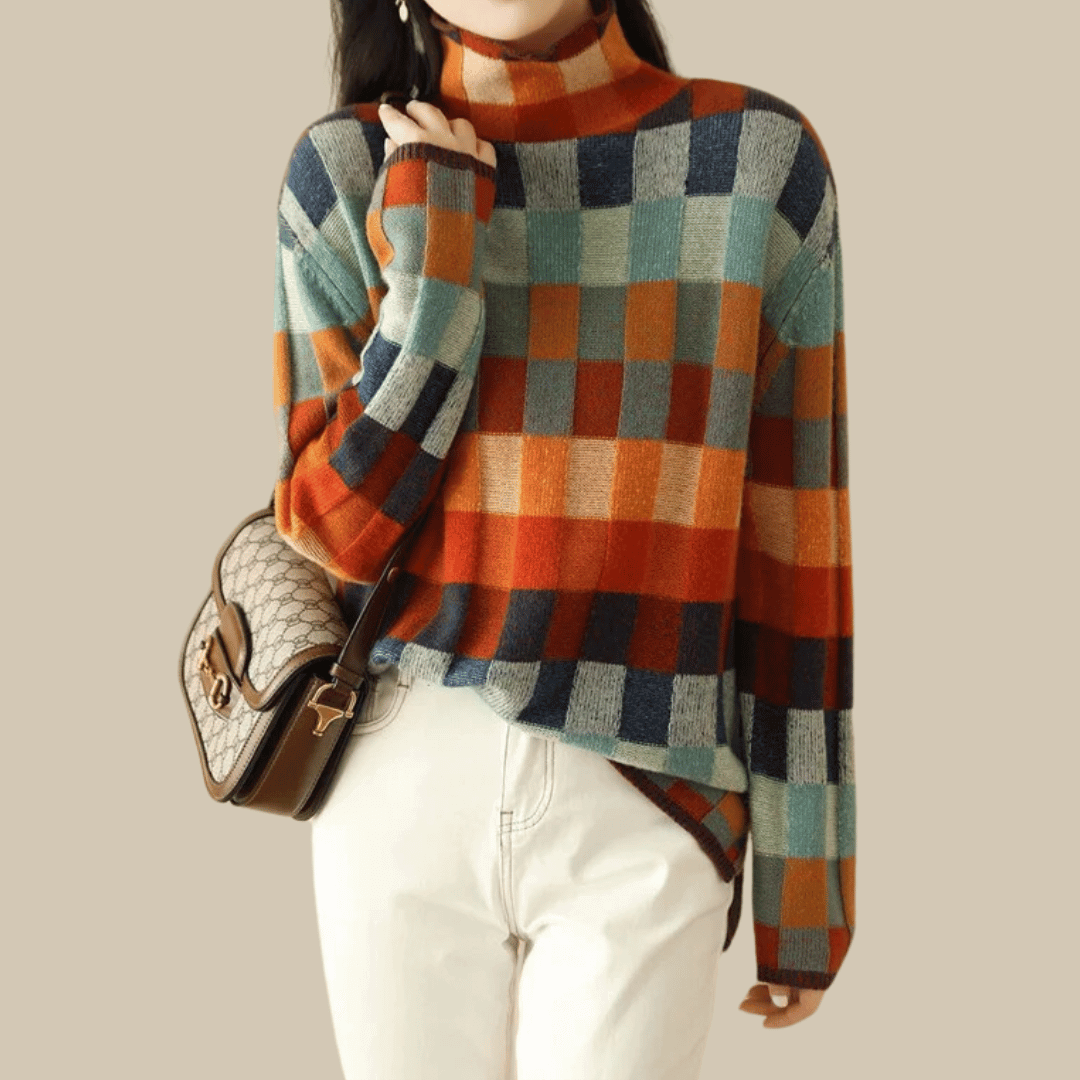 Women's patchwork cashmere turtleneck sweater, luxurious and cozy knitwear for elegant winter fashion.