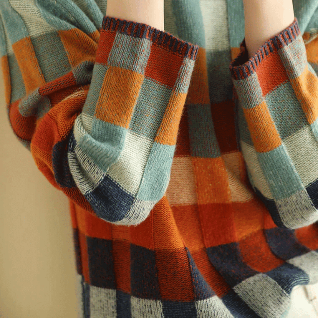 Stylish women's orange patchwork cashmere turtleneck, a luxurious and warm sweater for winter fashion.