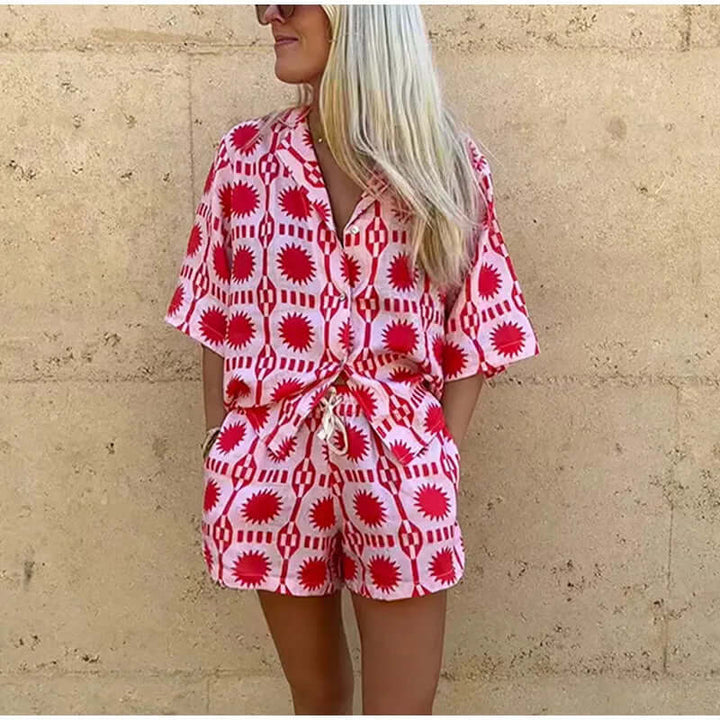 Women's pink geometric print co-ord set. Trendy summer two-piece with relaxed fit shorts for casual wear.
