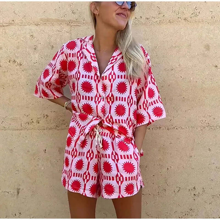 Casual & trendy women's geometric print co-ord set. Pink two-piece shorts set for comfortable summer fashion.