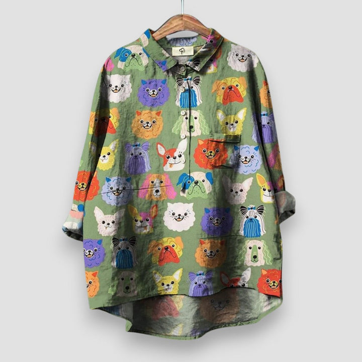 Detailed view of a women's dog print shirt, showcasing the unique animal print & soft fabric.
