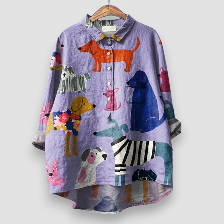 Model in a women's playful dog print shirt, a stylish & comfortable top for versatile casual outfits.