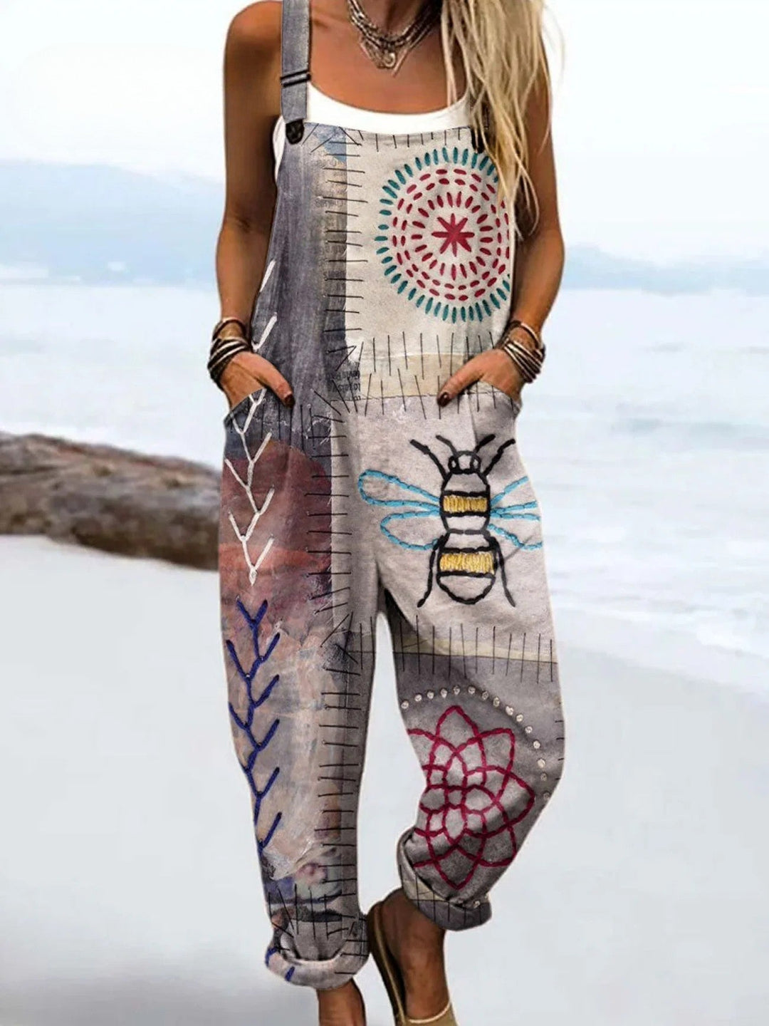 Women's playful patterned jumpsuit, comfortable dungarees for stylish casual wear. Chic spring/summer one-piece outfit.