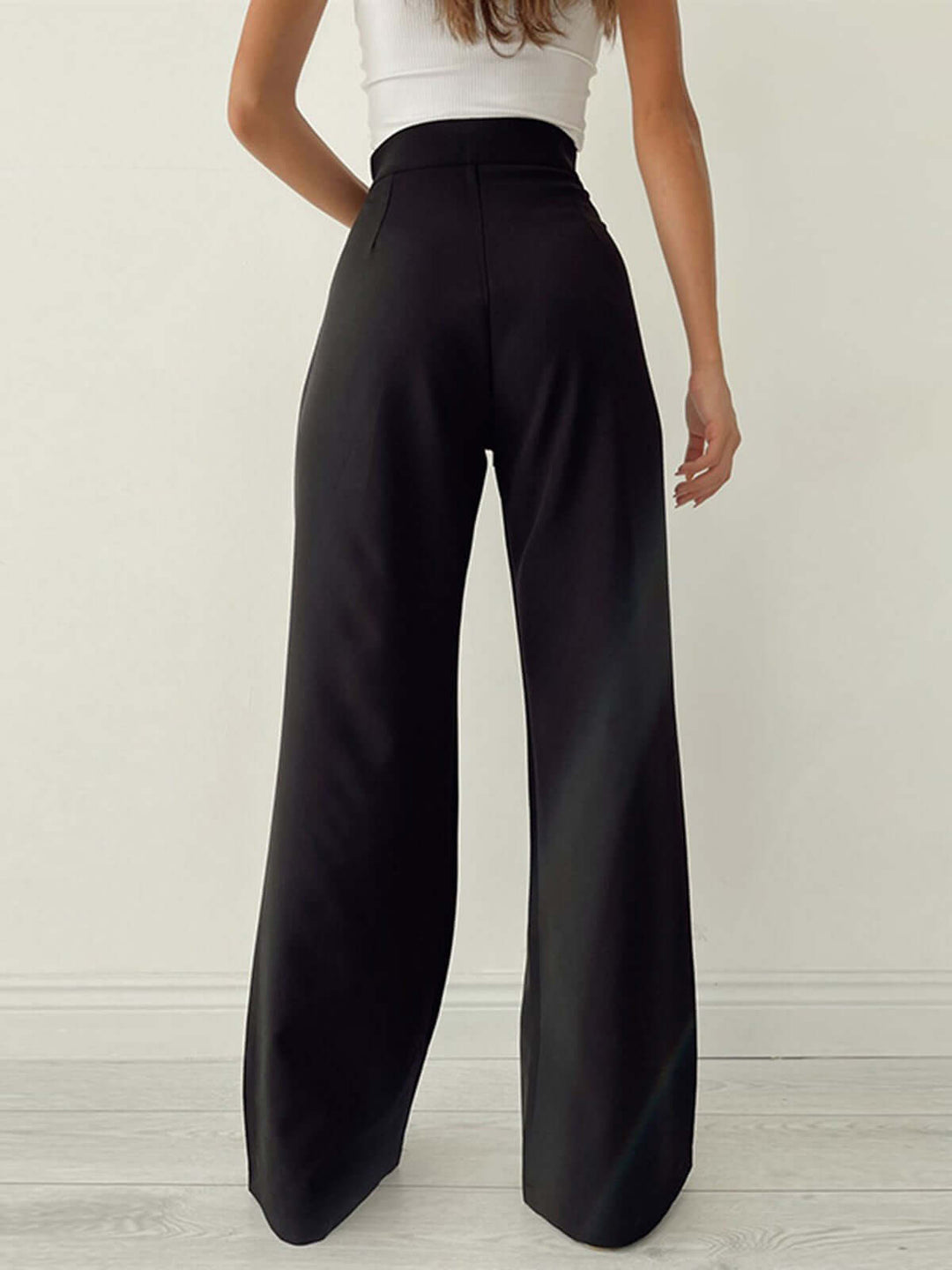 Elegant black wide-leg palazzo pants, high-waist with pleats, comfortable women's casual bottom.