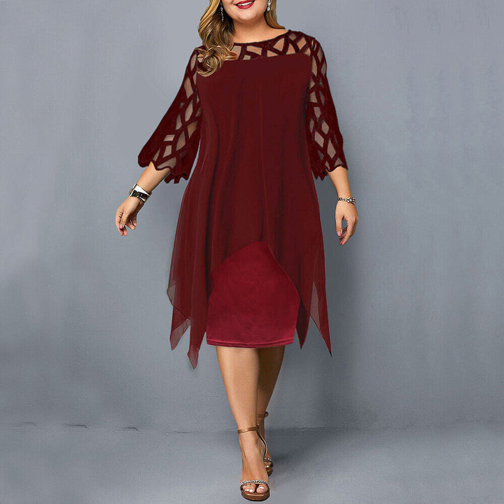 Blue plus size flowy midi dress. Comfortable and stylish midi length for curvy women.
