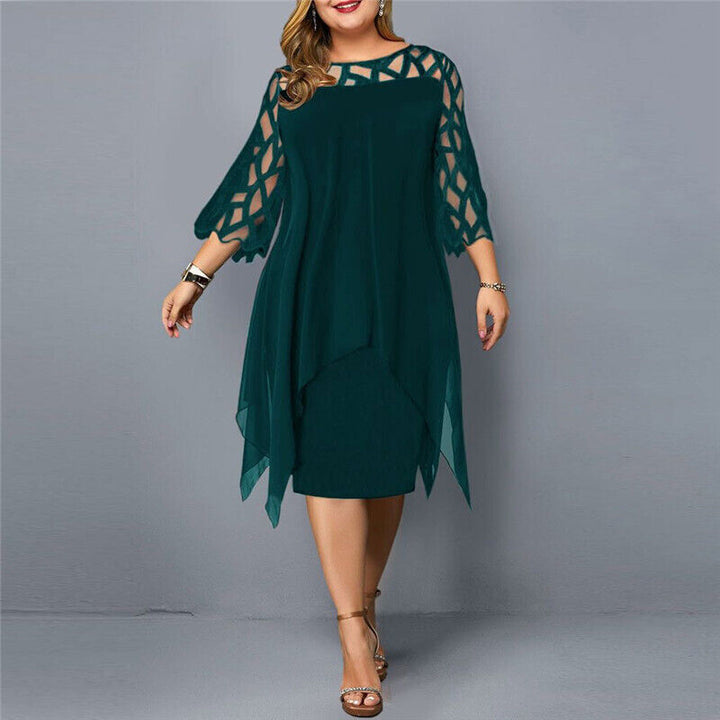 Black plus size flowy midi dress. Classic and refined for elegant curvy women's style.