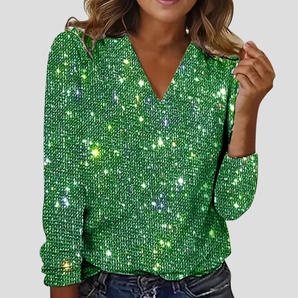 Elegant plus size sparkling V-neck blouse. Long sleeve top with glitter for women's special occasion fashion.