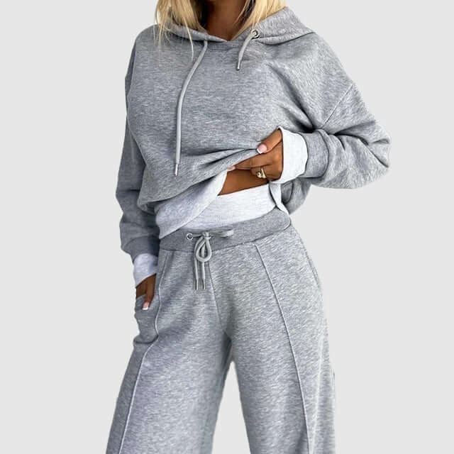 Cozy women's gray plush loungewear set, perfect for winter and fall relaxation. Soft two-piece comfort wear for home.