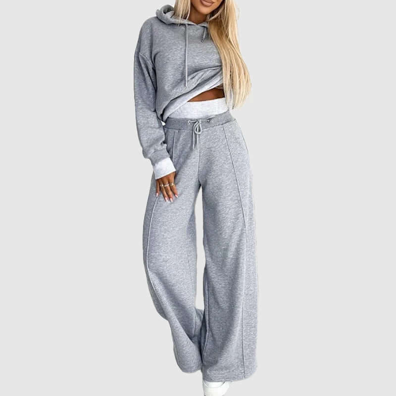 Soft women's plush loungewear set in beige, ideal for casual home wear & sleep. Cozy two-piece comfort for fall/winter.