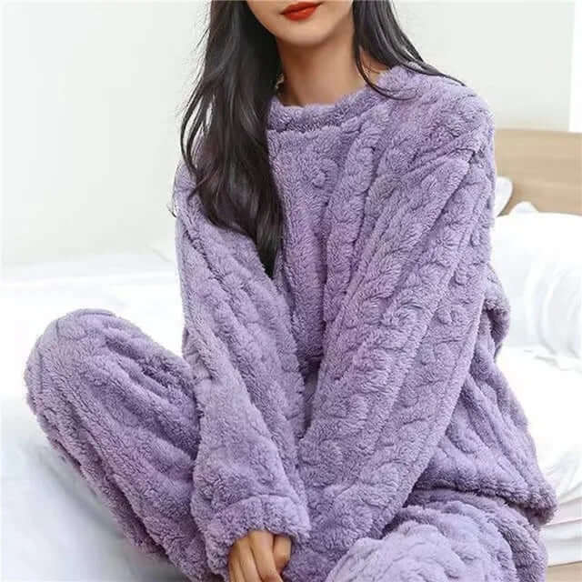 Women's plush fleece pajama set. Cozy and warm sleepwear for ultimate comfort and relaxation at home.