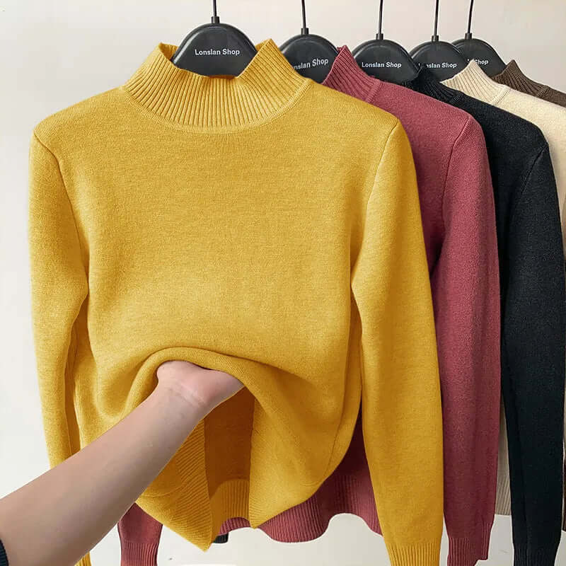 Woman wearing a cozy plush lined knitted sweater, embracing autumn and winter style.