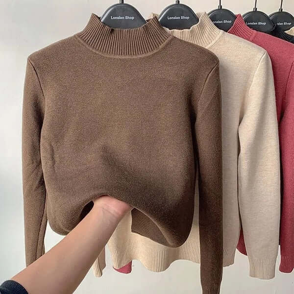 Comfortable women's plush lined sweater, a warm knitted top for cold weather.