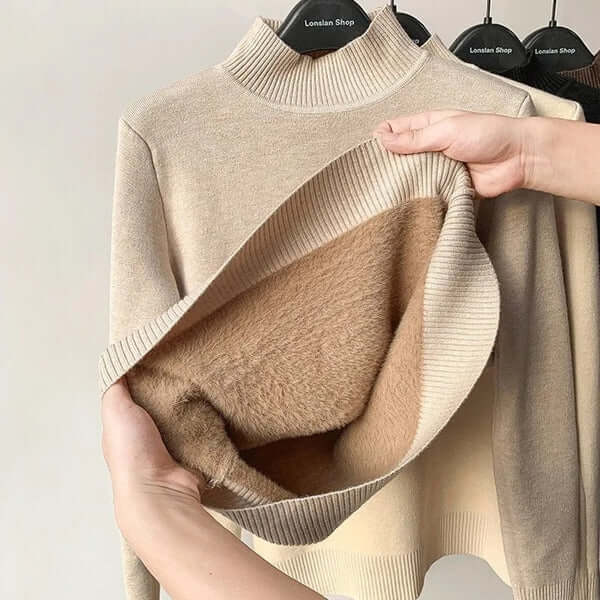 Trendy women's knitted sweater, plush lined, ideal for cozy winter fashion & style.