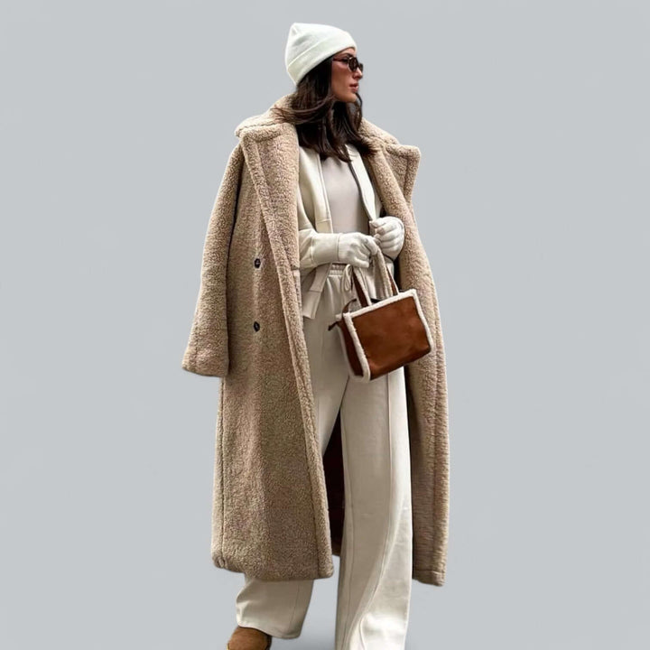 Women's plush teddy faux fur long coat, a chic and cozy winter outerwear piece. Perfect warm jacket.