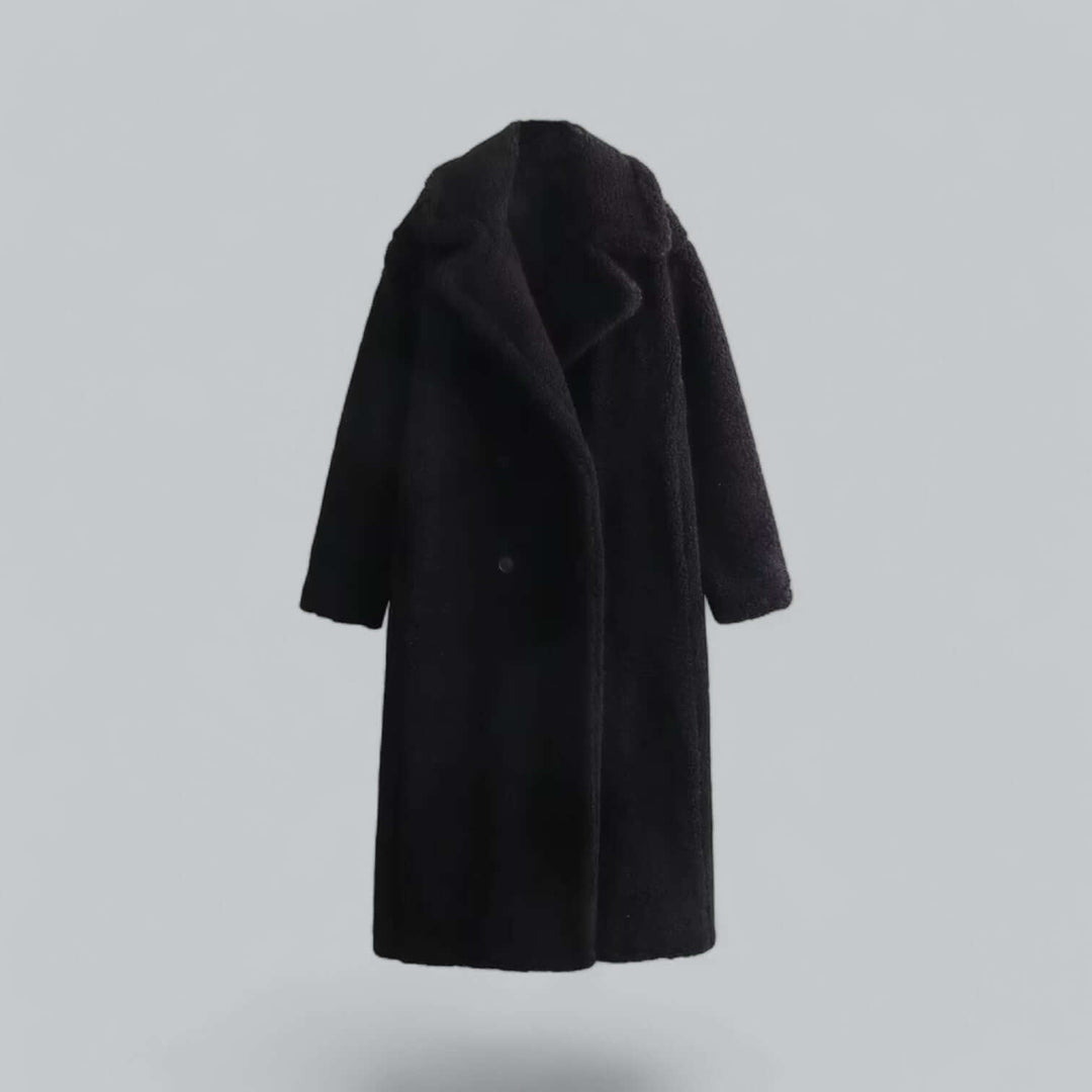 Warm women's winter coat, a long plush teddy faux fur jacket. Fashionable outerwear for cozy and chic style.