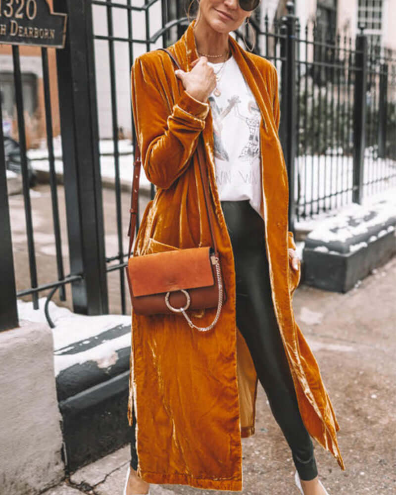 Warm women's velvet duster cardigan, elegant longline open front style perfect for cool weather comfort.