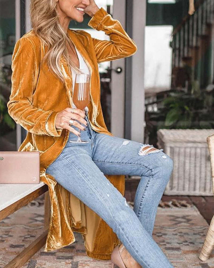 Luxurious plush velvet women's cardigan, longline duster silhouette with a graceful open front.