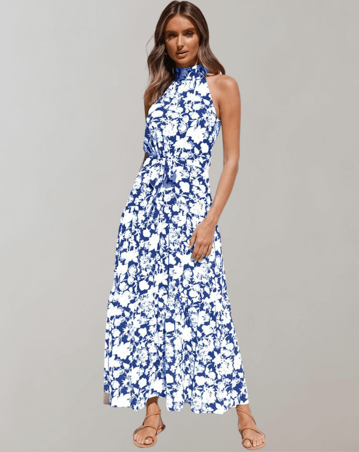 Flowy women's polka dot halter maxi dress, comfortable beachwear for summer.