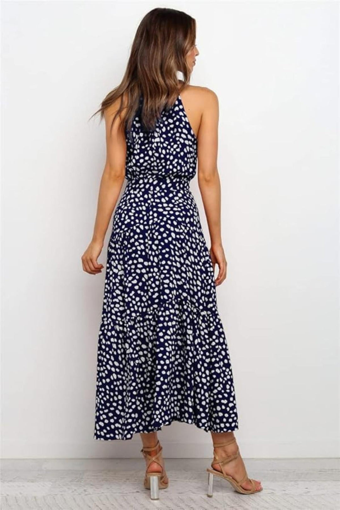 Elegant polka dot halter midi dress for women, great for summer parties and casual wear.