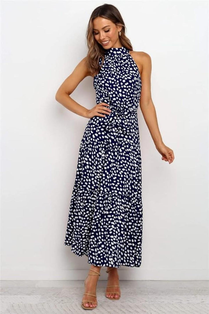Casual women's polka dot midi dress with adjustable halter neck & waist for summer comfort.