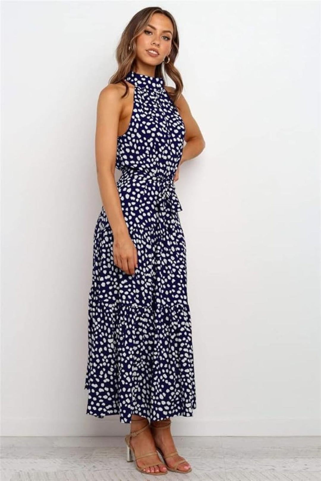 Chic white polka dot halter midi dress, a flowy and comfortable summer dress for women.