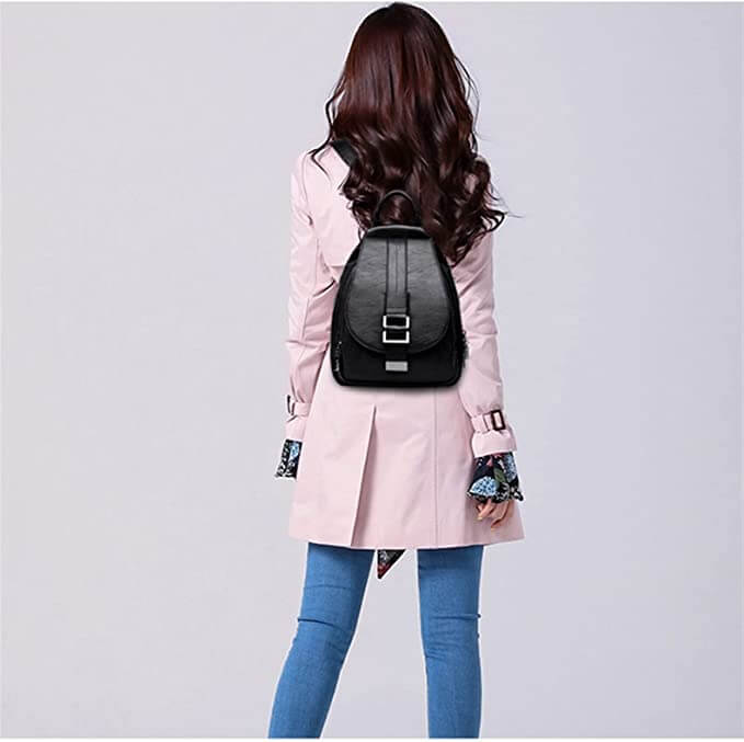 Modern women's premium leather backpack, water-resistant with comfortable adjustable straps.