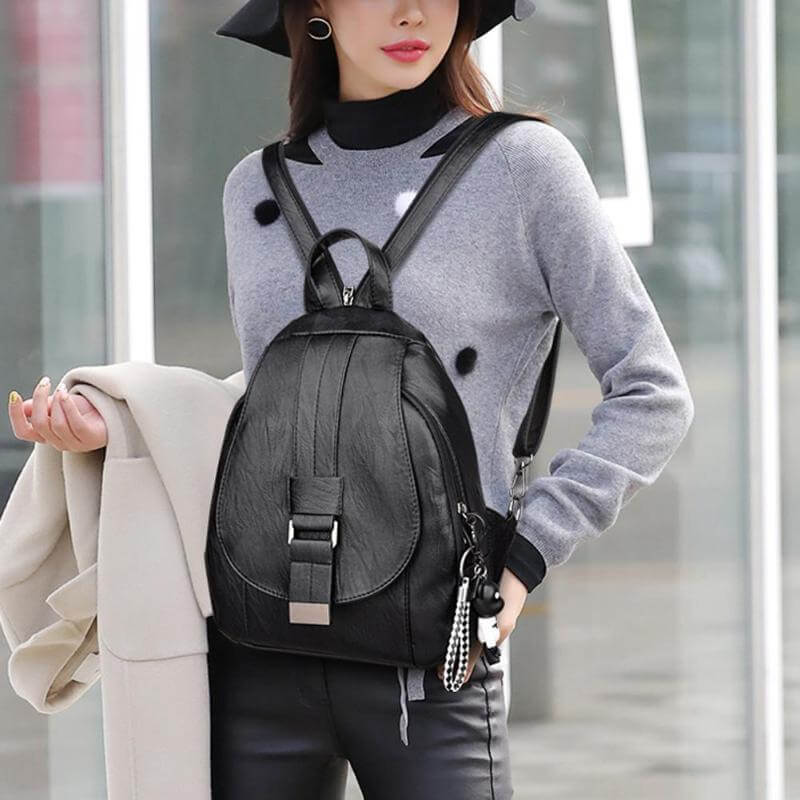Functional women's premium leather backpack, water-resistant for all weather conditions.