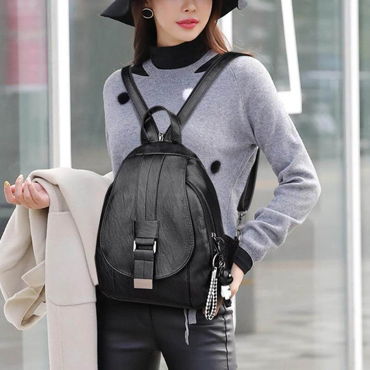 Functional women's premium leather backpack, water-resistant for all weather conditions.