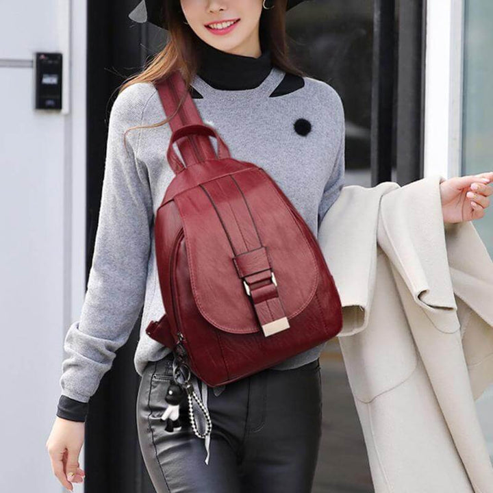 Sleek women's water-resistant leather backpack; perfect for city commuting & weekend trips.