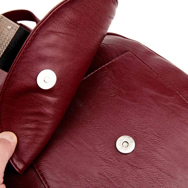 Comfortable women's water-resistant leather backpack; adjustable straps for all-day wearability.