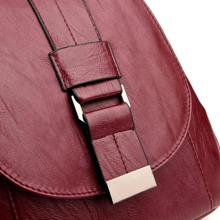 Versatile women's premium leather backpack; water-resistant for daily errands & short trips.