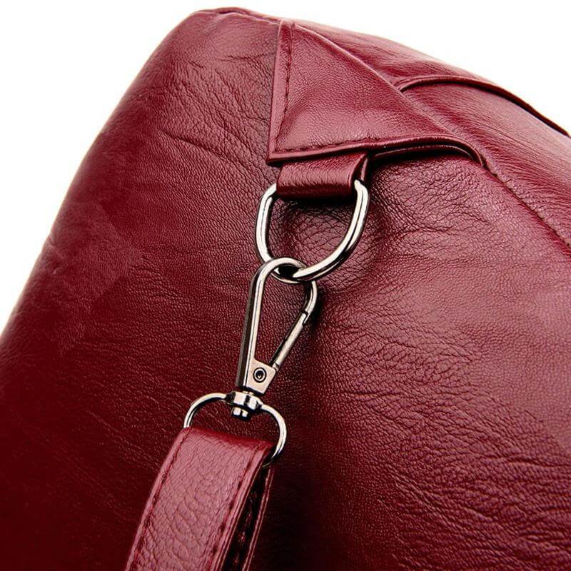 Chic water-resistant leather backpack for women; a sophisticated accessory for modern urban life.