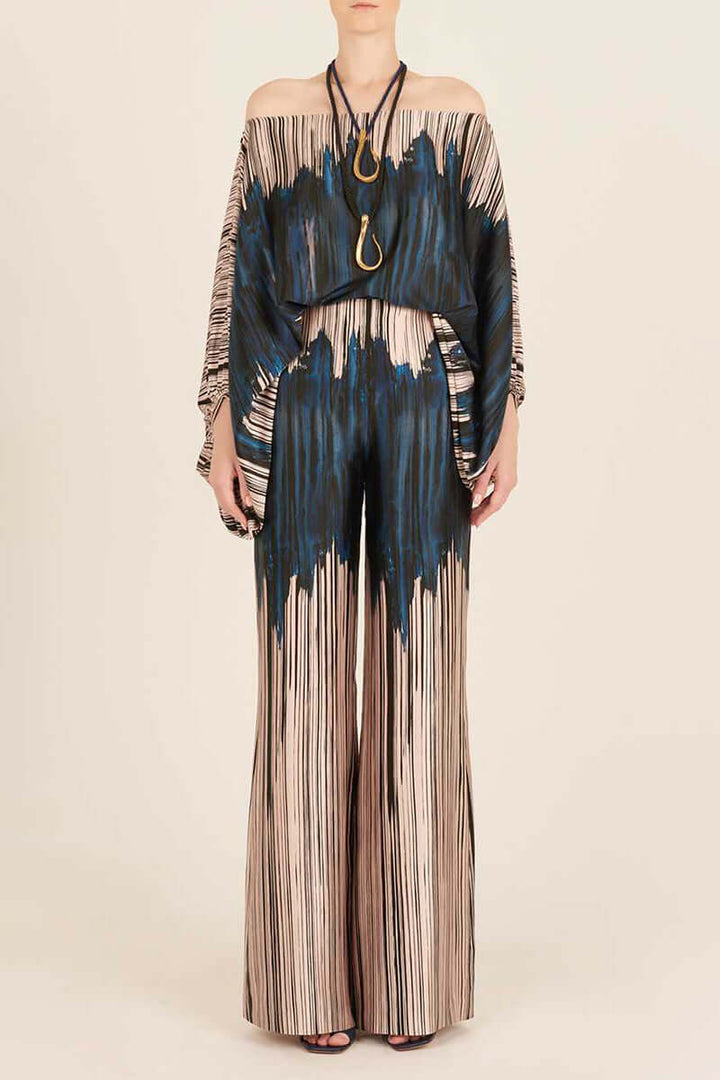 Chic women's printed off-shoulder long sleeve two-piece set with flowing skirt.