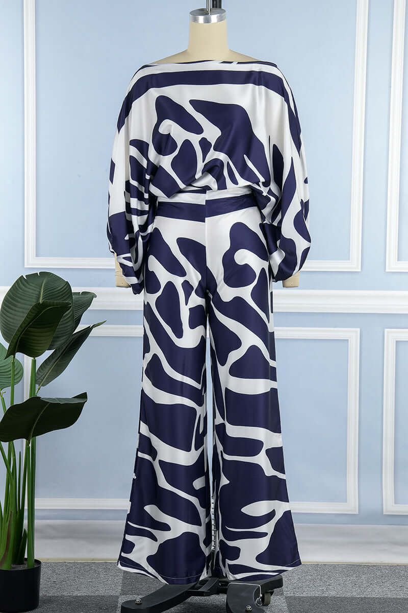 Versatile women's printed two-piece set, off-shoulder long sleeve top & skirt.