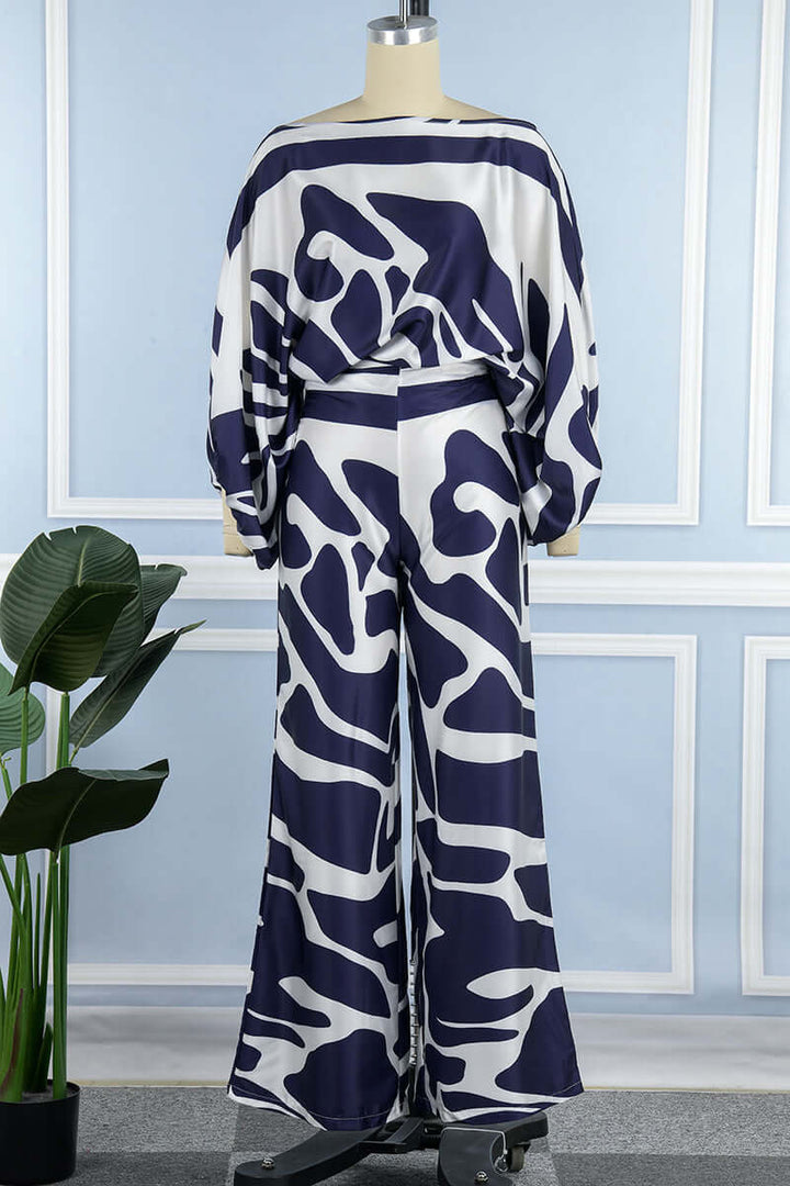 Versatile women's printed two-piece set, off-shoulder long sleeve top & skirt.
